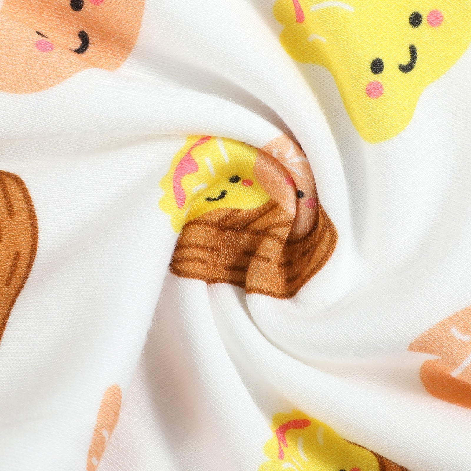 the wee bean super soft organic cotton and bamboo blend footed footie romper in dim sum