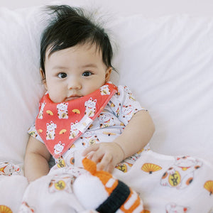 cute baby in lucky cat red bib