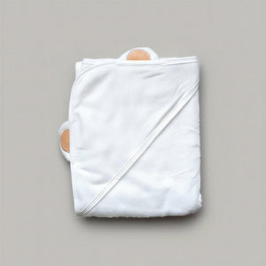 Folded white hooded bamboo baby kids towel with brown bear ears