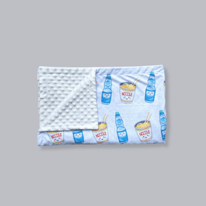 the wee bean minky fleece blanket in cup noodle and ramune soda texture