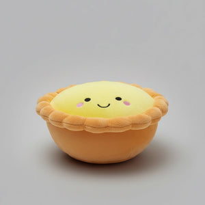 the wee bean plushie pillow snuggle buddy in egg tart top angle view