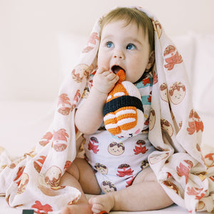 the wee bean organic baby swaddle bib and onesie in takoyaki