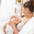 Mom breastfeeding newborn twb
