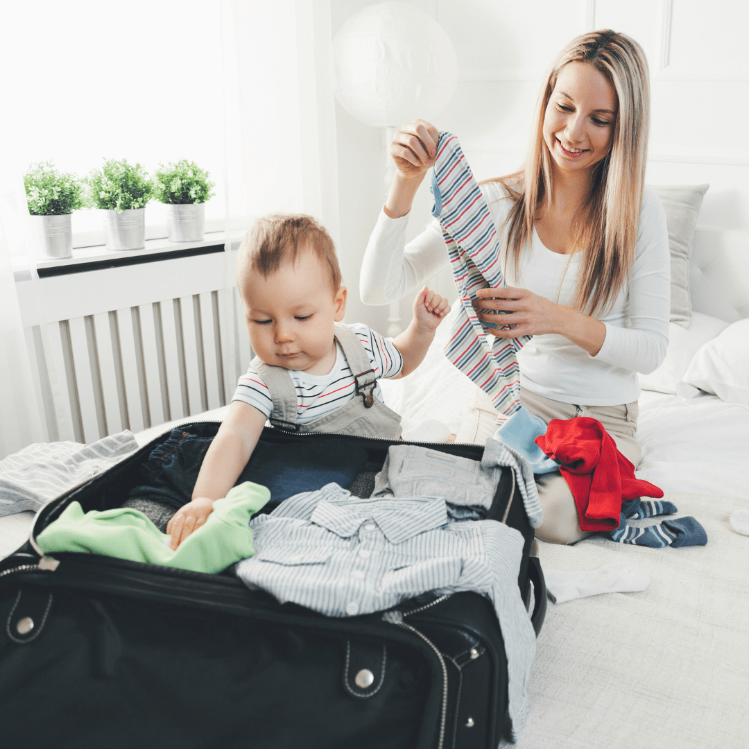 mom and baby packing for holiday