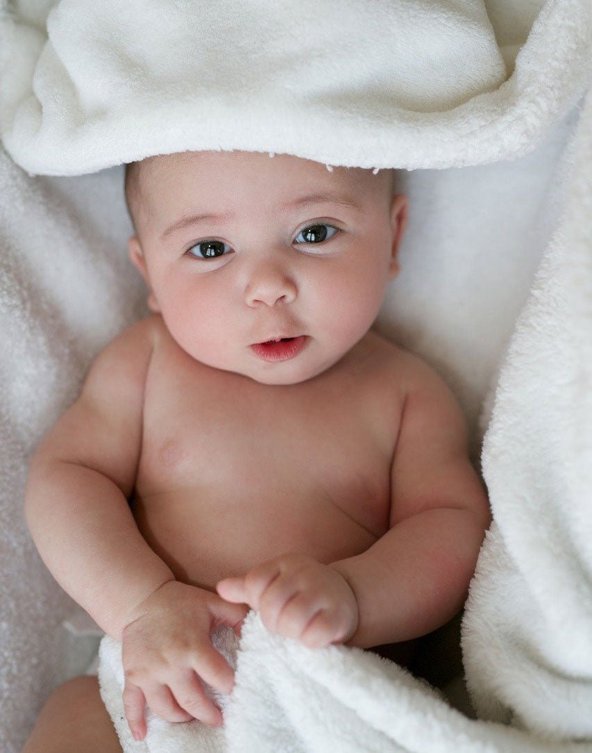 baby in bamboo hooded towel