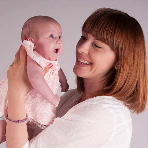 Mom with newborn baby girl