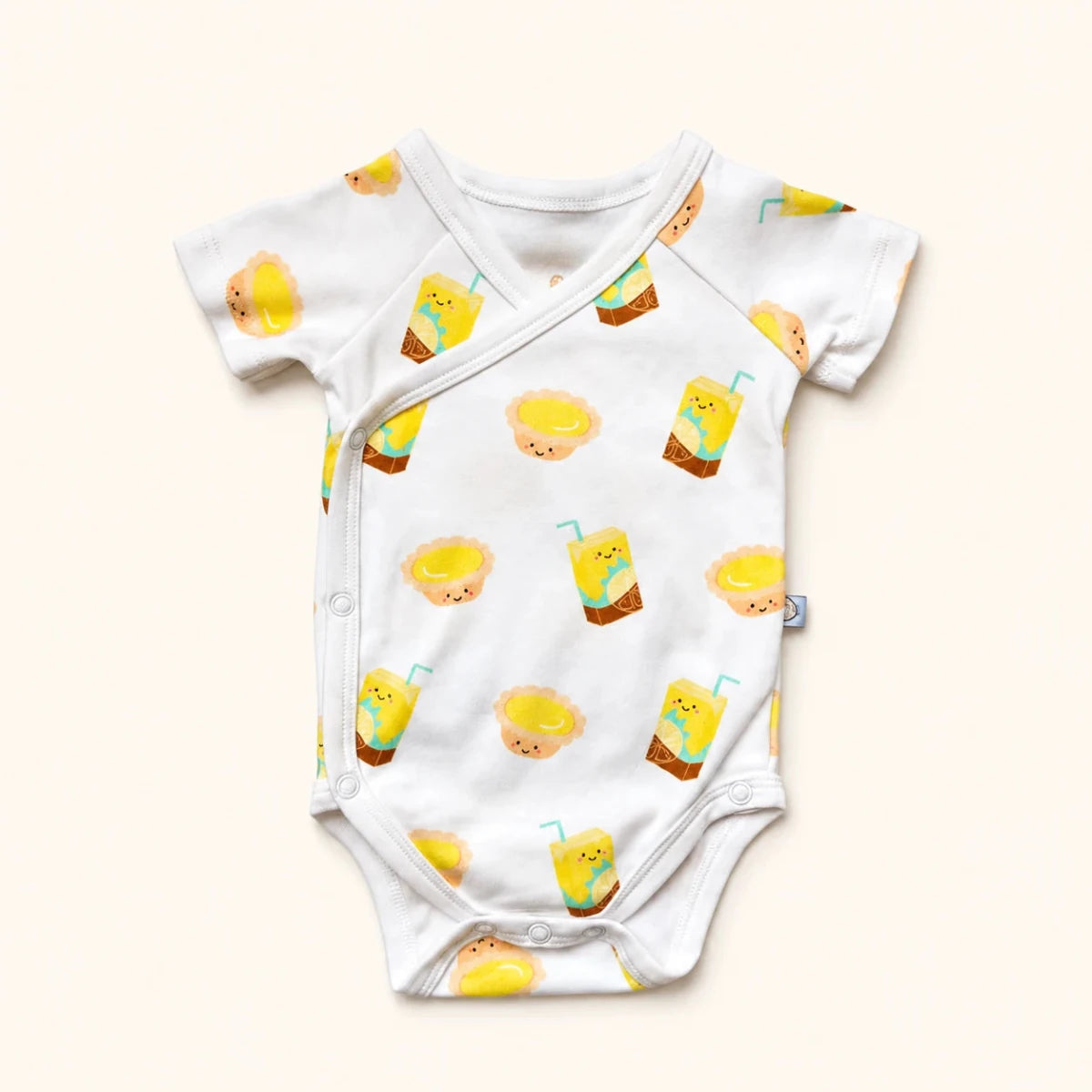 The Wee Bean Organic Cotton Short Sleeve Baby Onesie in Vita Lemon Tea and Egg Tart