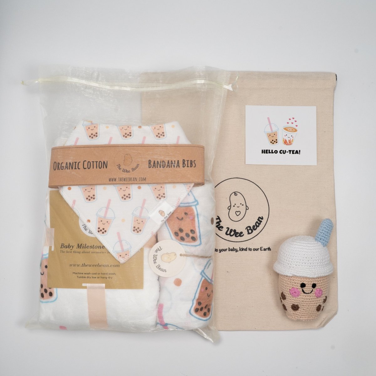 Boba Collection of baby products including a blanket, t-shirt, bib, and toys gift set
