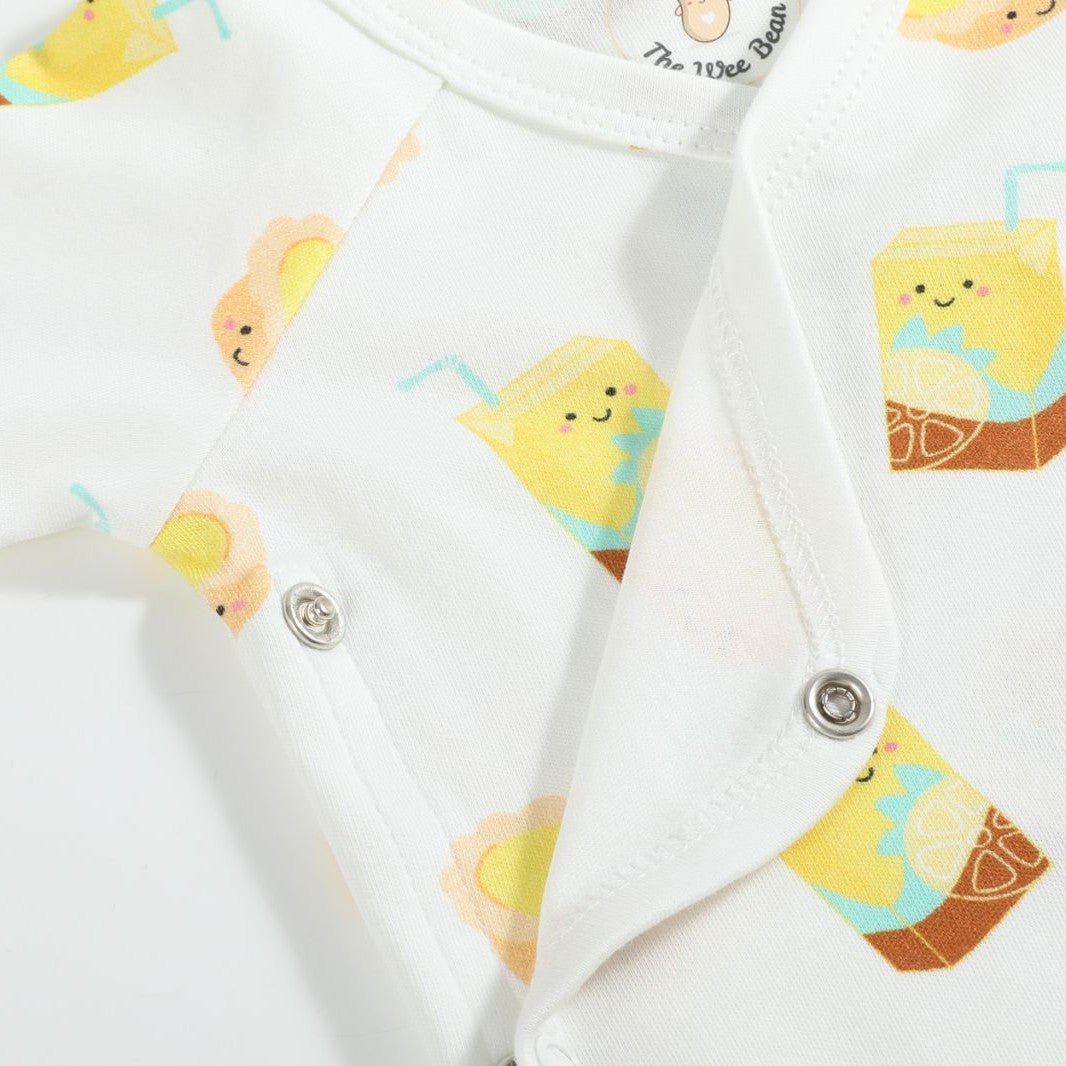 the wee bean organic cotton onesie lemon tea egg tart side snap buttons
