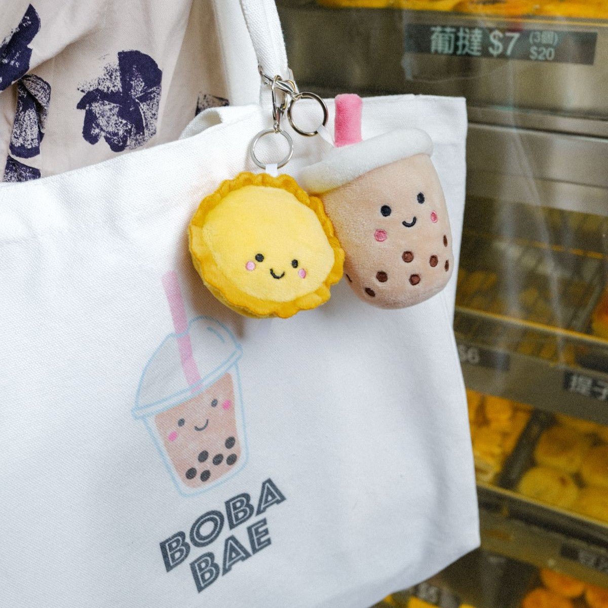 the wee bean cute egg tart bag charm on boba tote bag