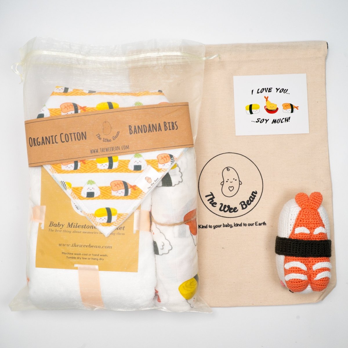 the wee bean organic and sustainable baby gift set with blankets bibs swaddle and rattle doll in taste of japan sushi tempura