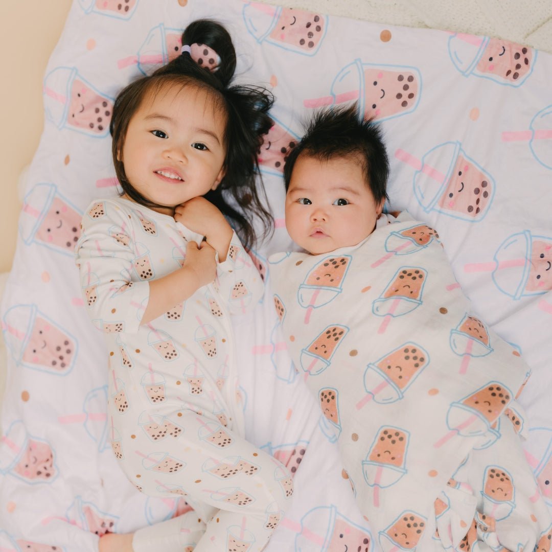  children laying on boba minky blanket