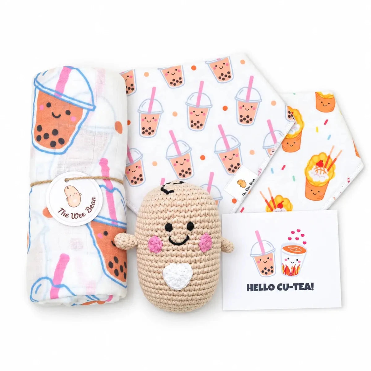 organic cotton and sustainable baby gift set in boba with swaddle, bib set and organic cotton crochet rattle doll