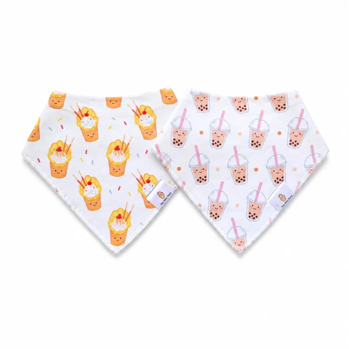 Two bandana bibs with boba bubble tea and egg waffle 
