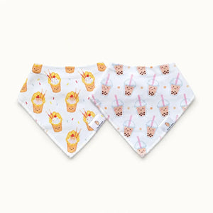 Two bandana bibs with boba bubble tea and egg waffle 