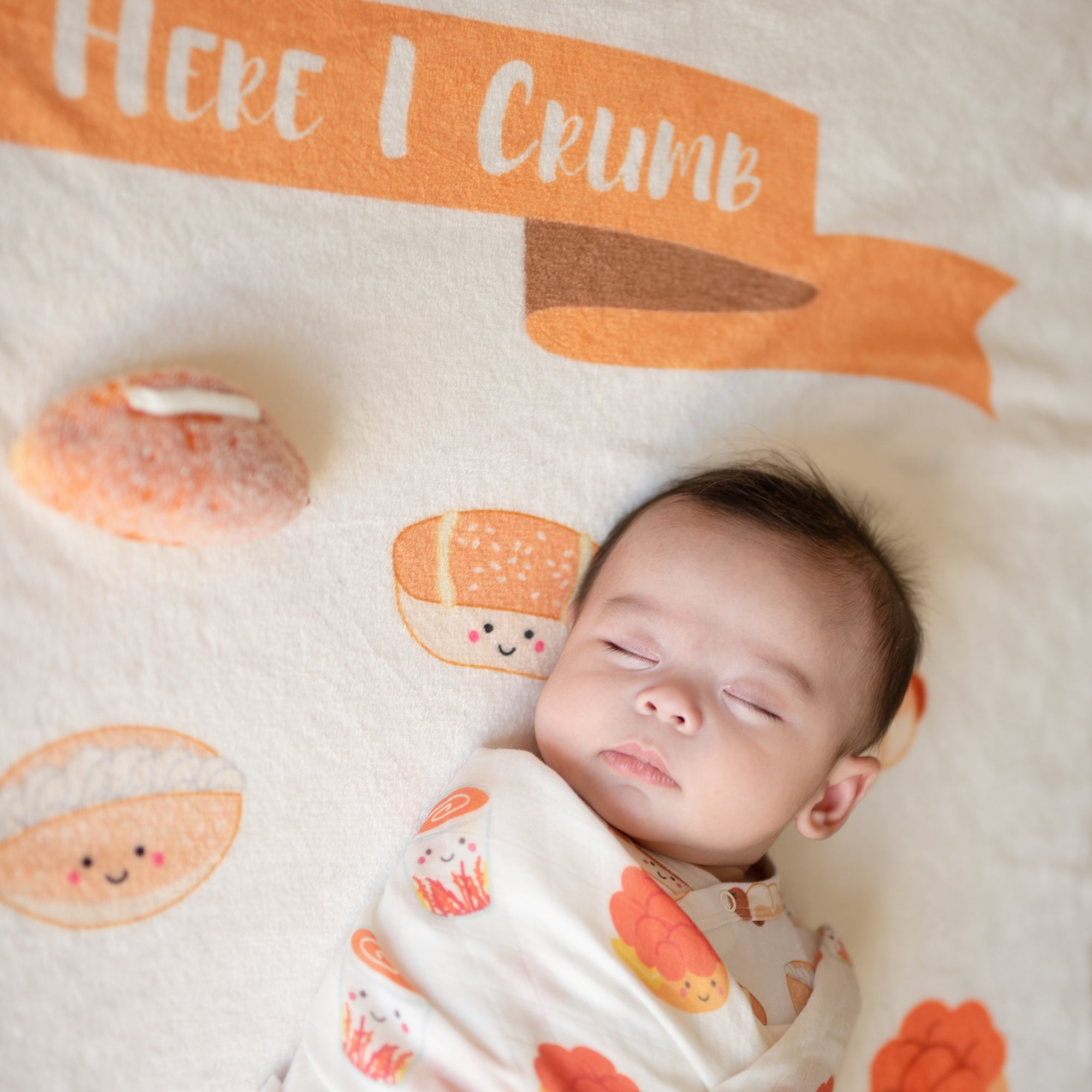 the wee bean welcome baby newborn gift set bakery buns sausage bun cocktail bun coconut cream bun organic swaddle milestone blanket organic cotton bandana bibs fair trade rattle doll