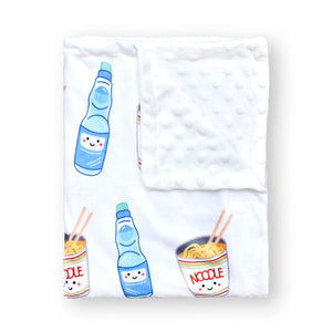 the wee bean minky fleece blanket in cup noodle and ramune soda with sensory stimulation