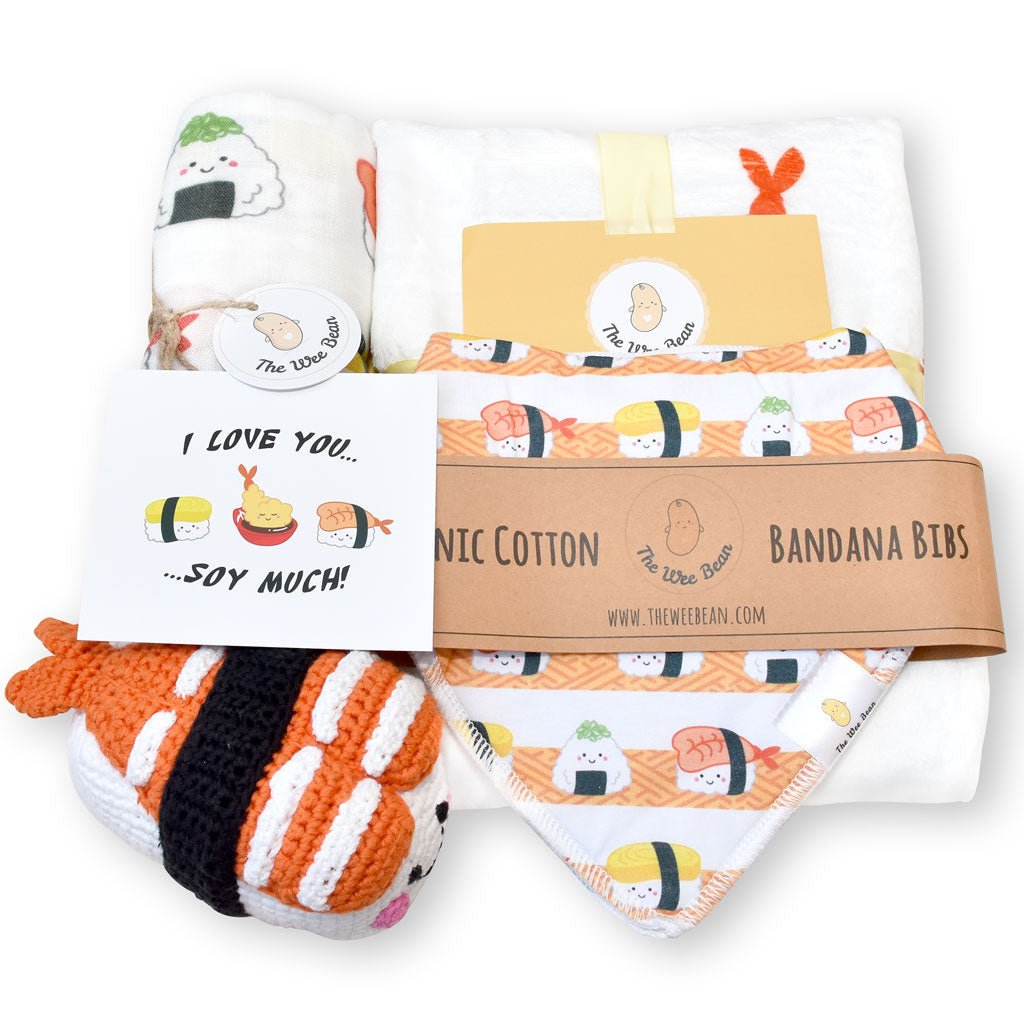 the wee bean organic and sustainable baby gift set with blankets bibs swaddle and rattle doll in taste of japan sushi tempura