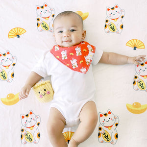 baby on the wee bean fleece blanket milestone blanket growth tracker in fortune lucky cat