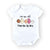 the wee bean organic cotton onesie in we are all human beans anti-hate anti-violence charity