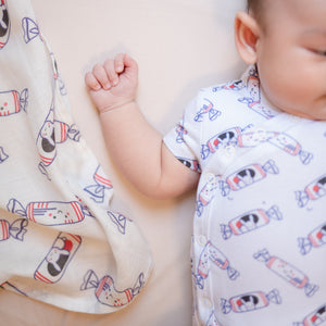 the wee bean organic cotton and bamboo swaddle and matching organic onesie in white rabbit candy