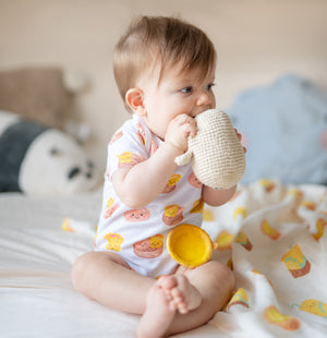 cute baby teething in the wee bean super soft organic cotton baby onesie bodysuit romper in dim sum from taste of hong kong collection