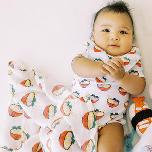 cute newborn baby in ramen swaddle from the wee bean