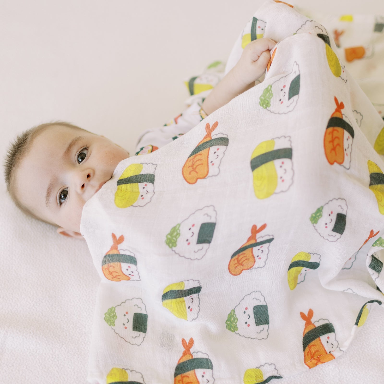 the wee bean organic and sustainable big baby gift set with blankets bibs swaddle and rattle doll in taste of japan sushi tempura