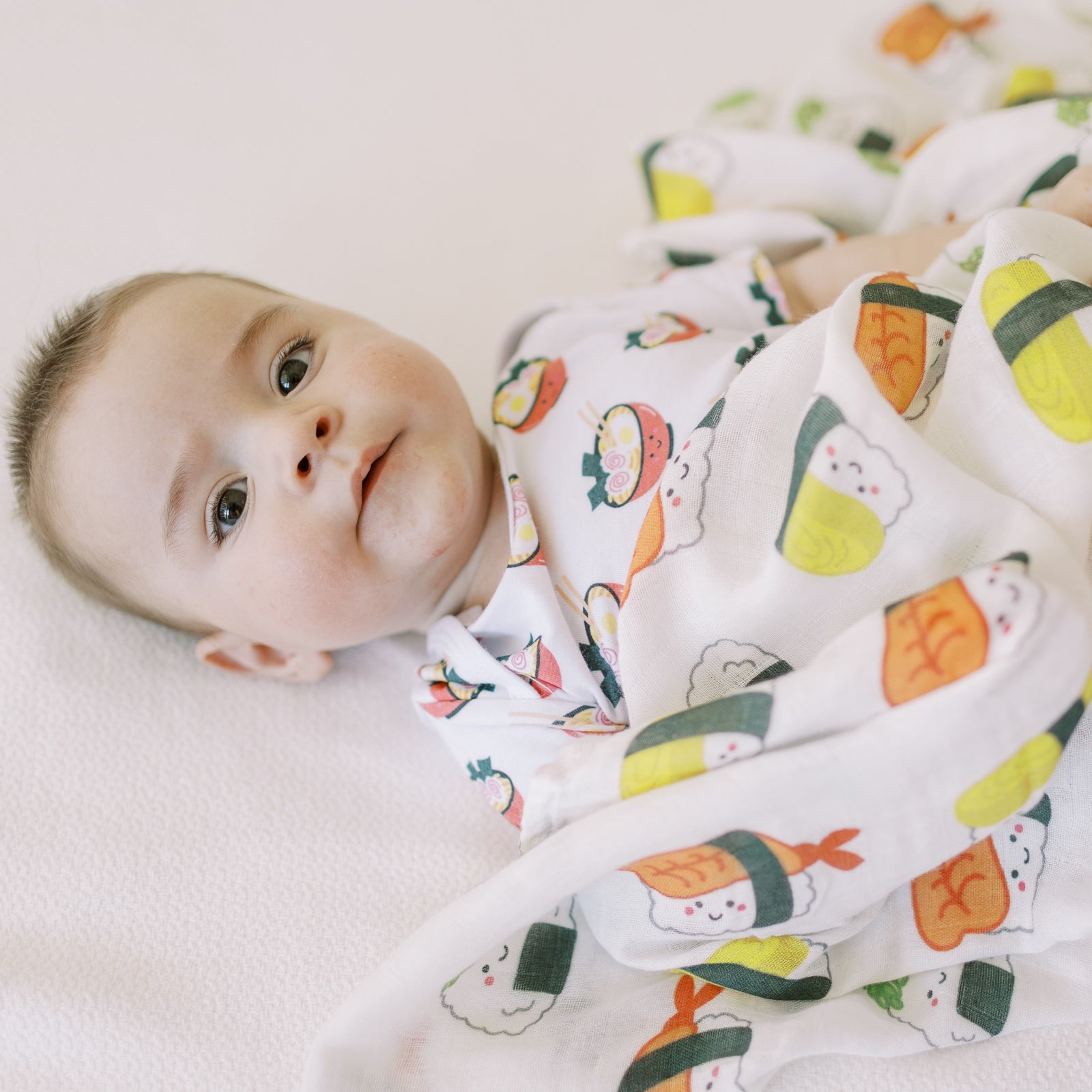 the wee bean taste of japan organic cotton and bamboo swaddle in sushi ebi shrimp and tamago egg nigiri and onigiri