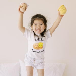 cute girl in the wee bean organic cotton kids toddler t-shirts in dim sum little dumpling