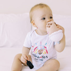 cute baby chewing on boba dolls in the wee bean organic cotton onesie bodysuit romper in boba equality equalitea