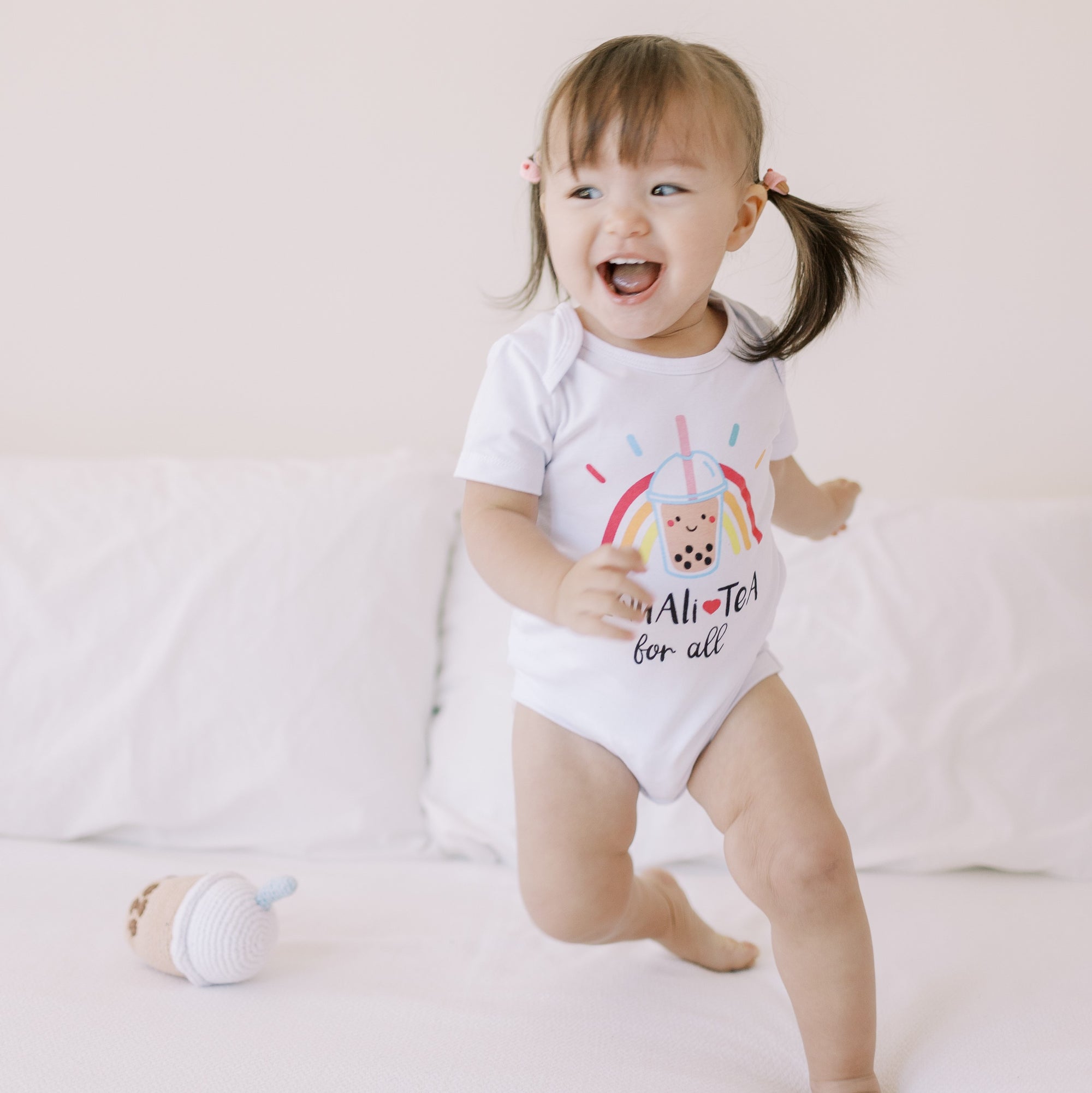 the wee bean organic cotton onesie in boba equali-tea for all anti-hate anti-violence charity