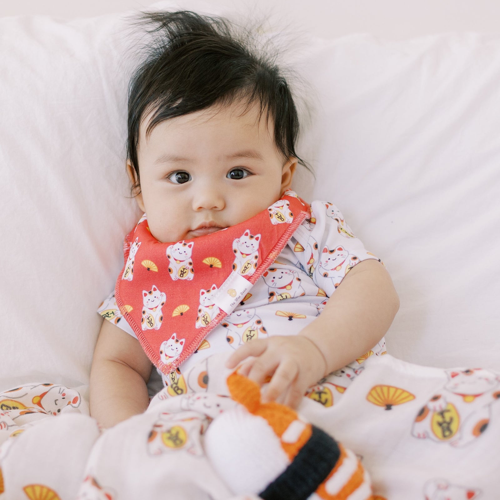 the wee bean organic cotton baby onesie bodysuit in takoyaki octopus balls 