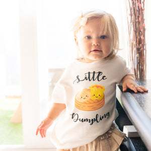 cute girl in the wee bean organic cotton kids toddler t-shirts in dim sum little dumpling