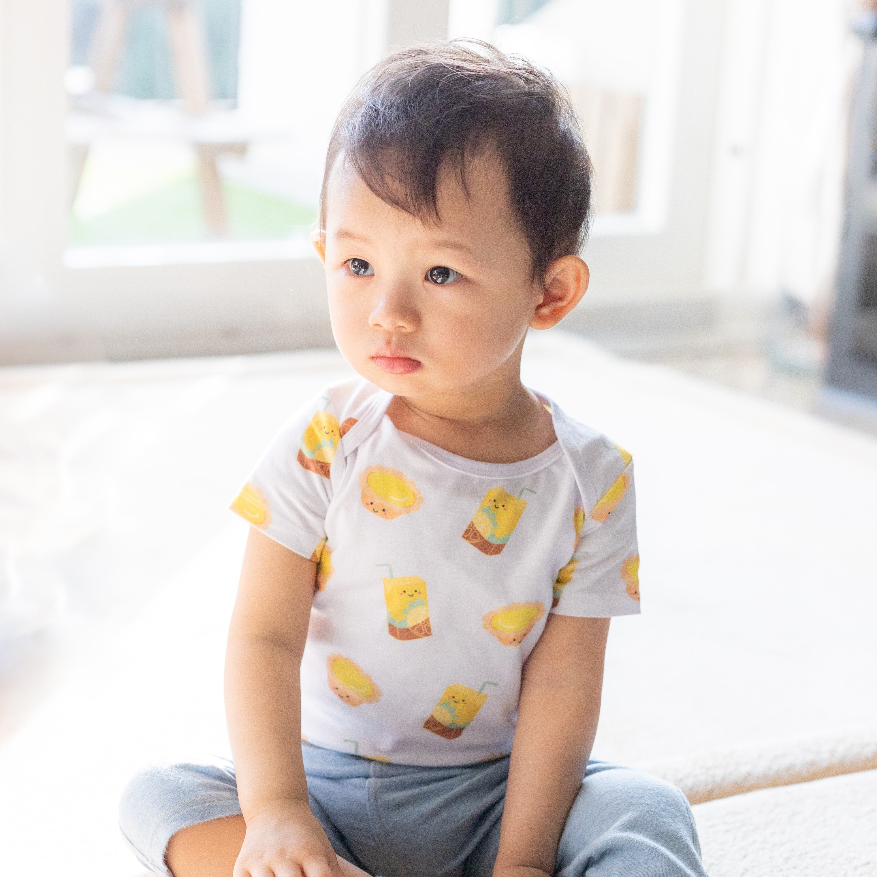 the wee bean organic cotton onesie in egg tart and lemon tea